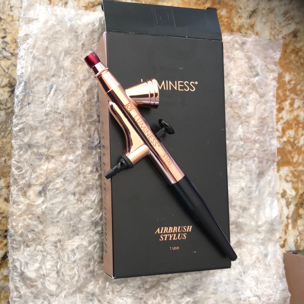 Luminess AirBrush Stylus, rose gold, never used.  Paid $83, asking $30